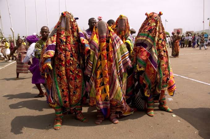 Masquerades Flog Girl Bitterly, As Boyfriend Tries To Fight Back (Video)